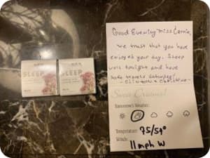 A welcome note laying on a counter