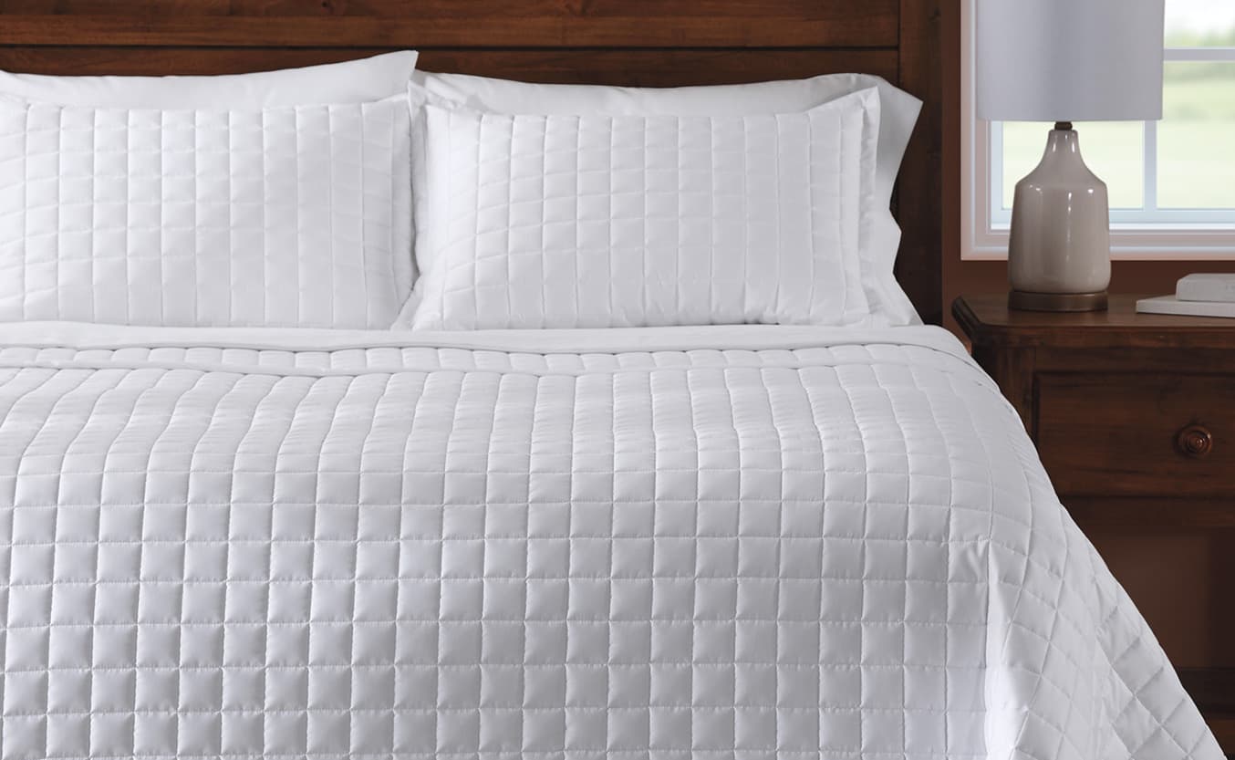 Bed with white sheets