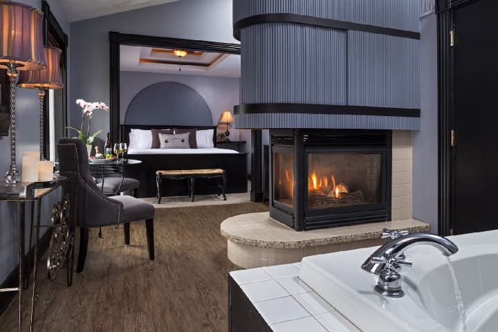 Luxury Sir Lancelot Suite with fireplace and soaking tub at Castle in the Country bed and breakfast