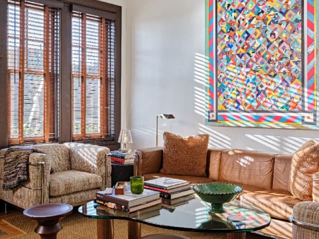 Sitting room with fireplace and couches
