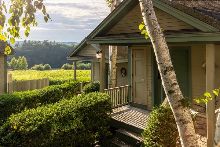 exterior entrance of our cottages on a golden summer evening