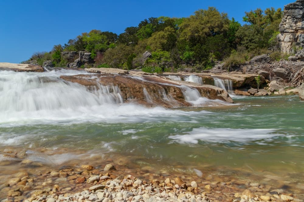 One of the top things to do in Hill Country in Texas is to play in the water at places like Pedernales Falls State Park